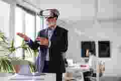Senior leader wearing VR glasses