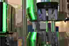 Explode view of electric vehicle chassis equipped with battery pack on the road. 3D rendering image.