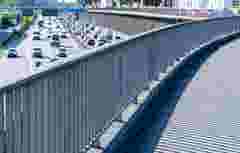 Railing of a bridge against highway in city, Berlin Wilmersdorf A100