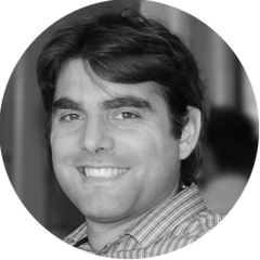 Black and white portrait, with rounded image, of Ryan Young, Engineering Manager of OEM Sensors at HBK. Ryan is one of the experts for the OEM Solution Day 2023, which take place on the 21st and 22nd of March at the HBK in Darmstadt, Germany