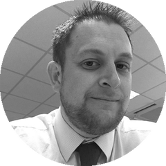 Black and white portrait of Chris Wynn-Jones, Application Engineer – Reliability at HBK
