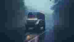 Unmanned vehicle driving on a street in the rain