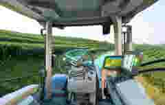 Autonomous tractor working in a tea field