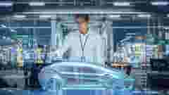 Green Energy Car Design: Automotive Engineer Using Augmented Reality Hologram to Construct 3D Model of High-Tech Electric Vehicle Optimizing Battery Efficiency. Automated Robot Arm Manufacturing