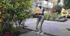 THEMIS Humanoid Robot by Westwood Robotics carrying and delivering a package