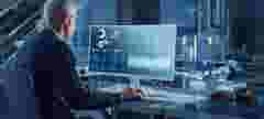 Professional Heavy Industry Engineer Works on Computer Uses CAD Software to Design 3D Industrial Machinery Component. In the Background Robot Arm Concept. Over the Shoulder Shot; Torque; T210; test bench;