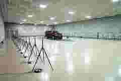 Red car in an anechoic chamber for indoor test-by testing of the noise
