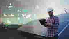 Engineer analysing solar panels data, digital future job concept graphics