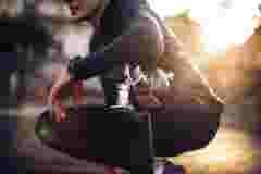 Athlete is sitting down with a robotic leg and knee joint