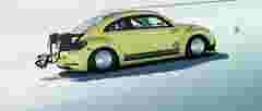 yellow Volkswagen in an end-of-line (EoL) production testing with HBK's DISCOM system