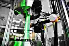 Explode view of electric vehicle chassis equipped with battery pack on the road. 3D rendering image.